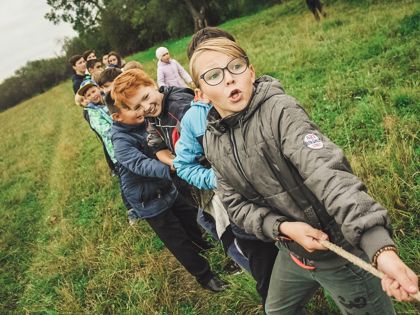 Children playing tug of war