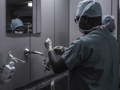 Surgeon scrubbing up.jpg