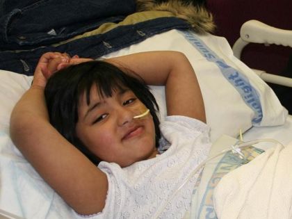 young girl with nasogastric tube